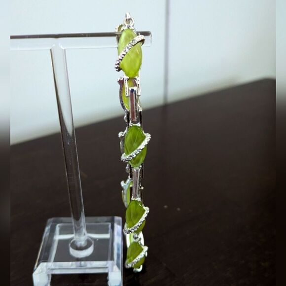 Avon Faux Citrine and Cubic Zirconia Silvertone Tennis Bracelet with Expander - Picture 6 of 9